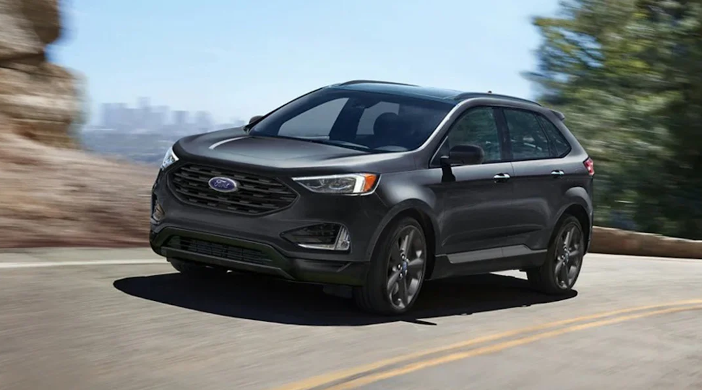 The Ford Edge driving on a street